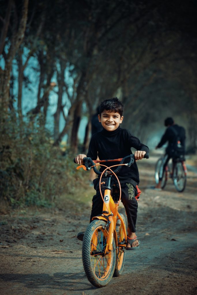 photo-of-boy-riding-bicycle-3619972